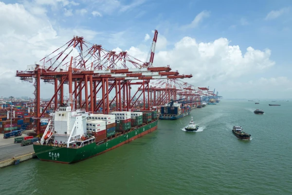 Aerial panoramic view of Guangzhou Nansha Port with container terminals and quay cranes.