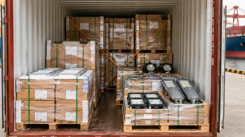 LED lighting fixtures securely palletized and loaded inside a shipping container for Saudi Arabia delivery